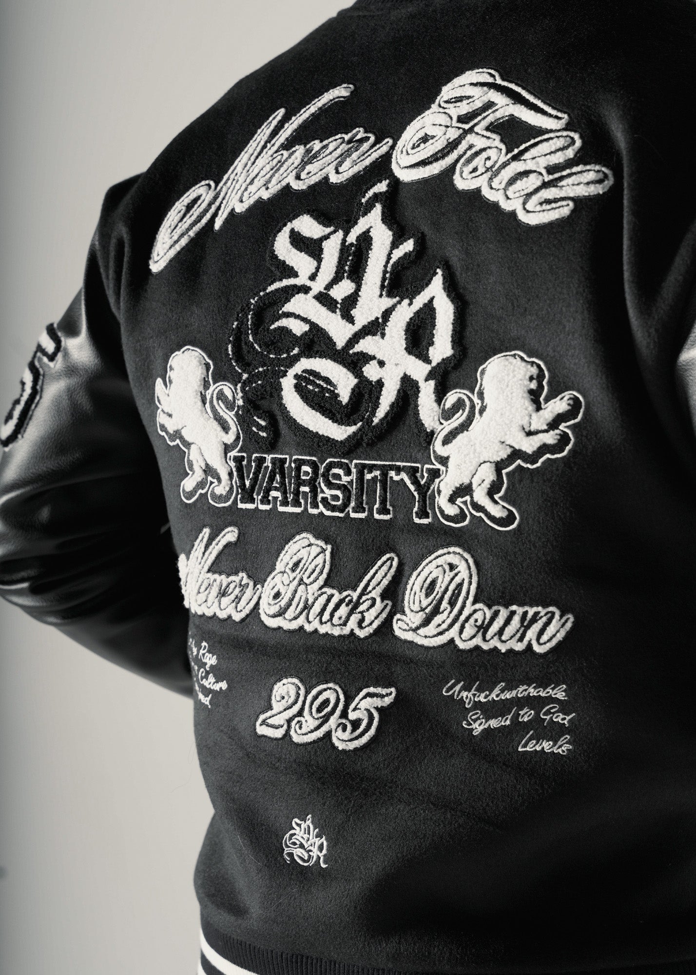 NEVER FOLD ULTIMATUM VARSITY BOMBER JACKET